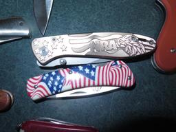 Misc new folding pocket knives including NRA, Pheasants Forever, Mossy Oak~