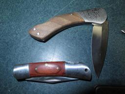 Misc new folding pocket knives including NRA, Pheasants Forever, Mossy Oak~