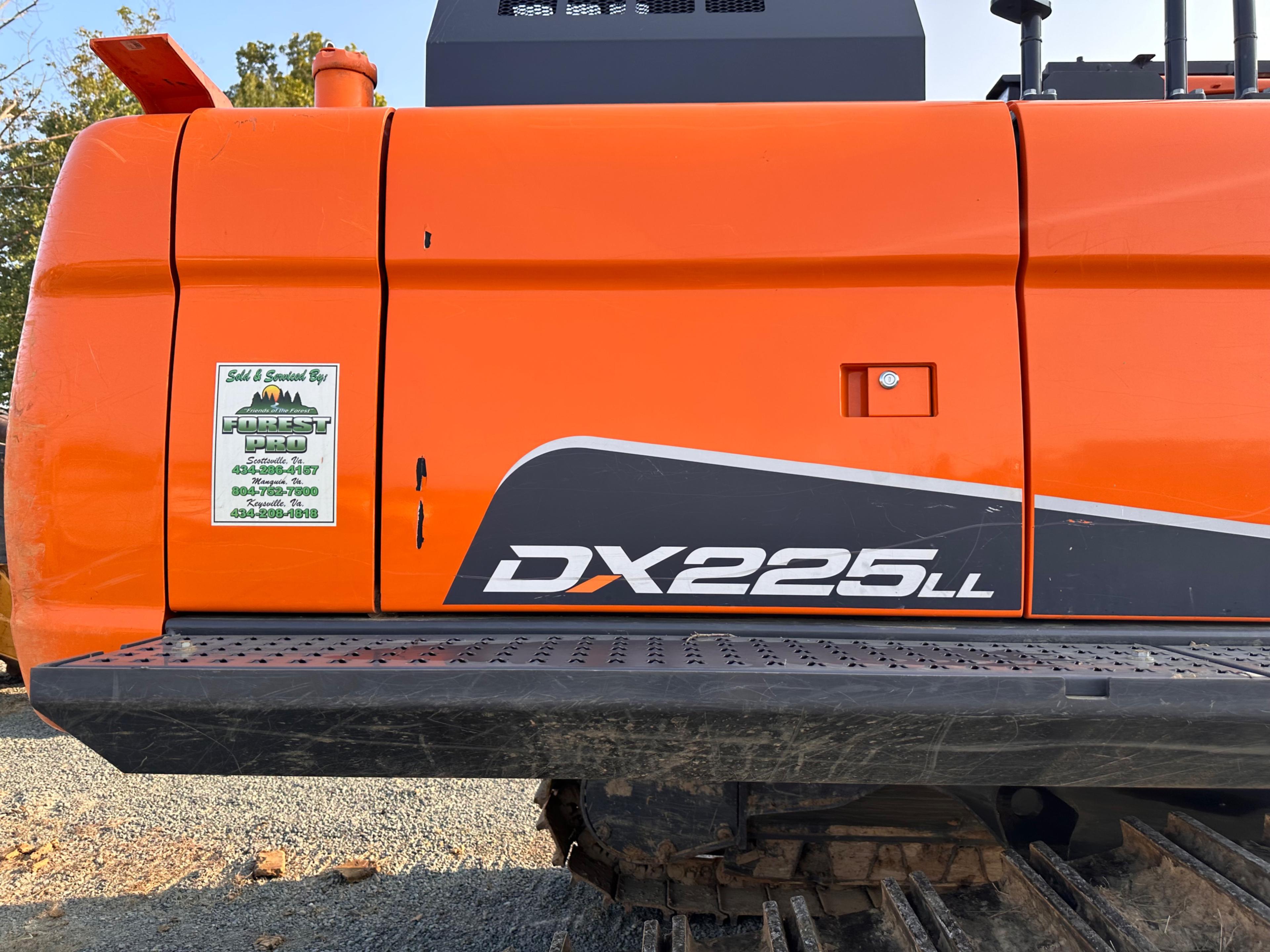 Doosan DX225LL Excavator With Rotodec Grapple Attachment