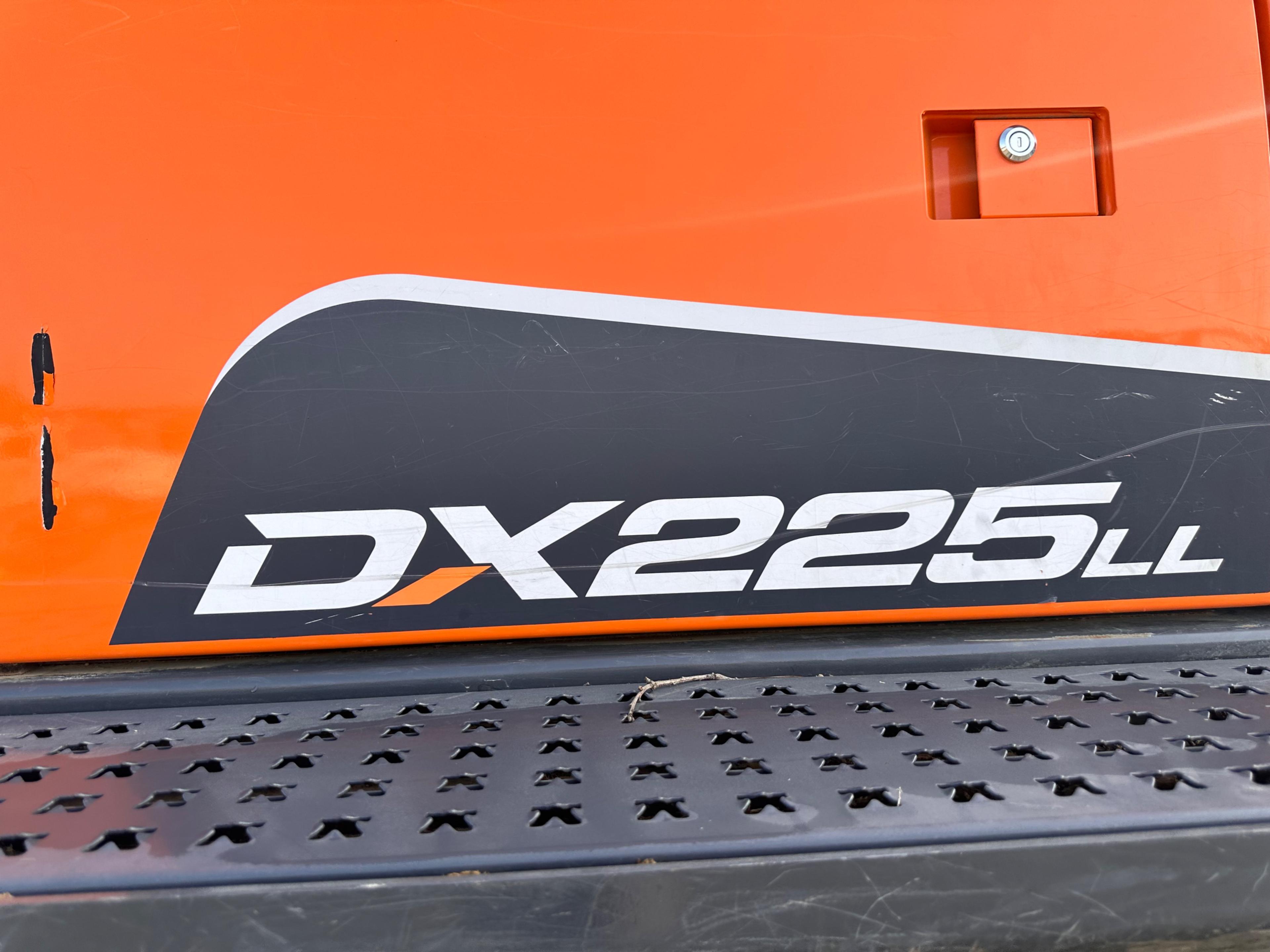 Doosan DX225LL Excavator With Rotodec Grapple Attachment