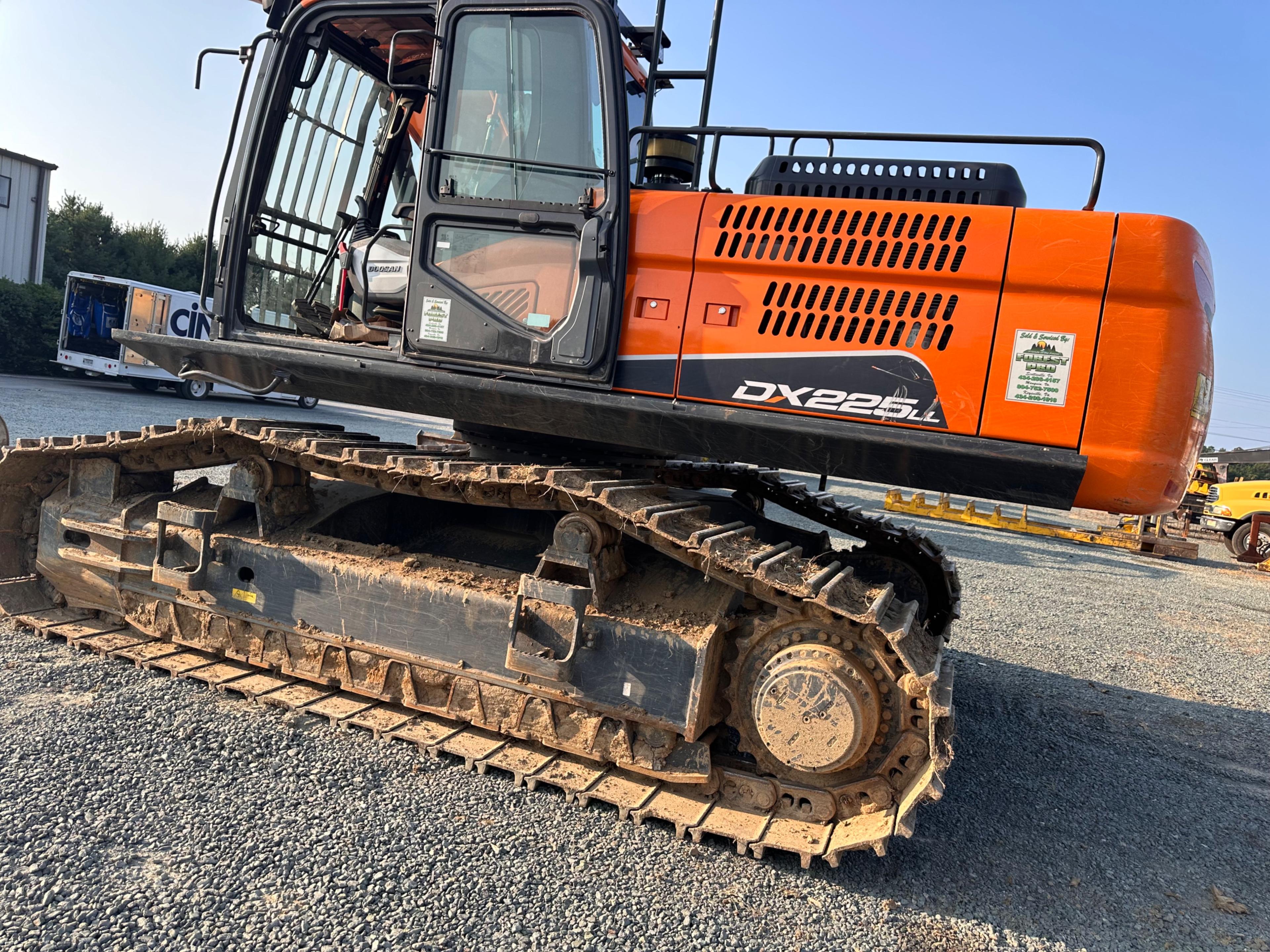 Doosan DX225LL Excavator With Rotodec Grapple Attachment