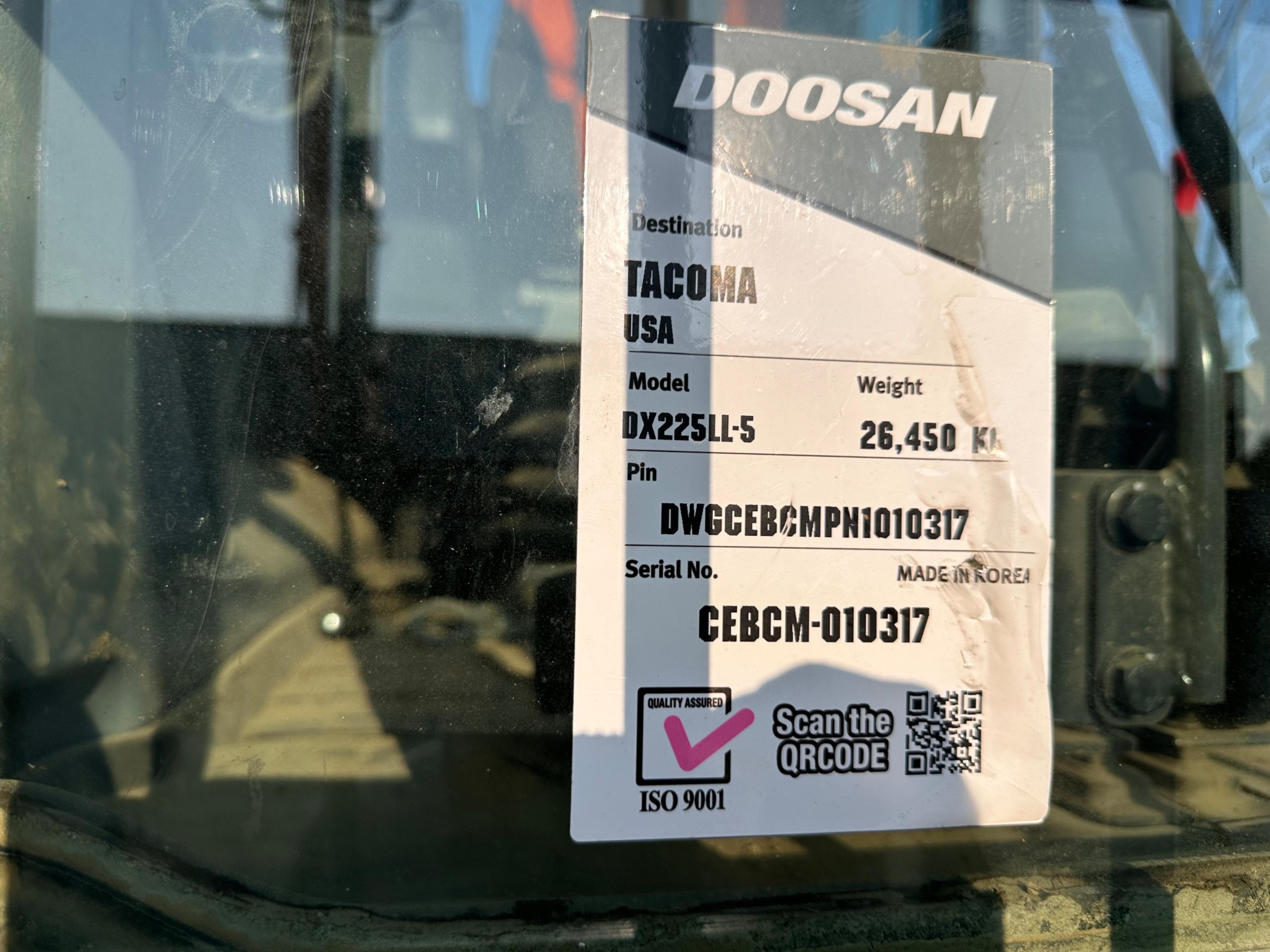 Doosan DX225LL Excavator With Rotodec Grapple Attachment