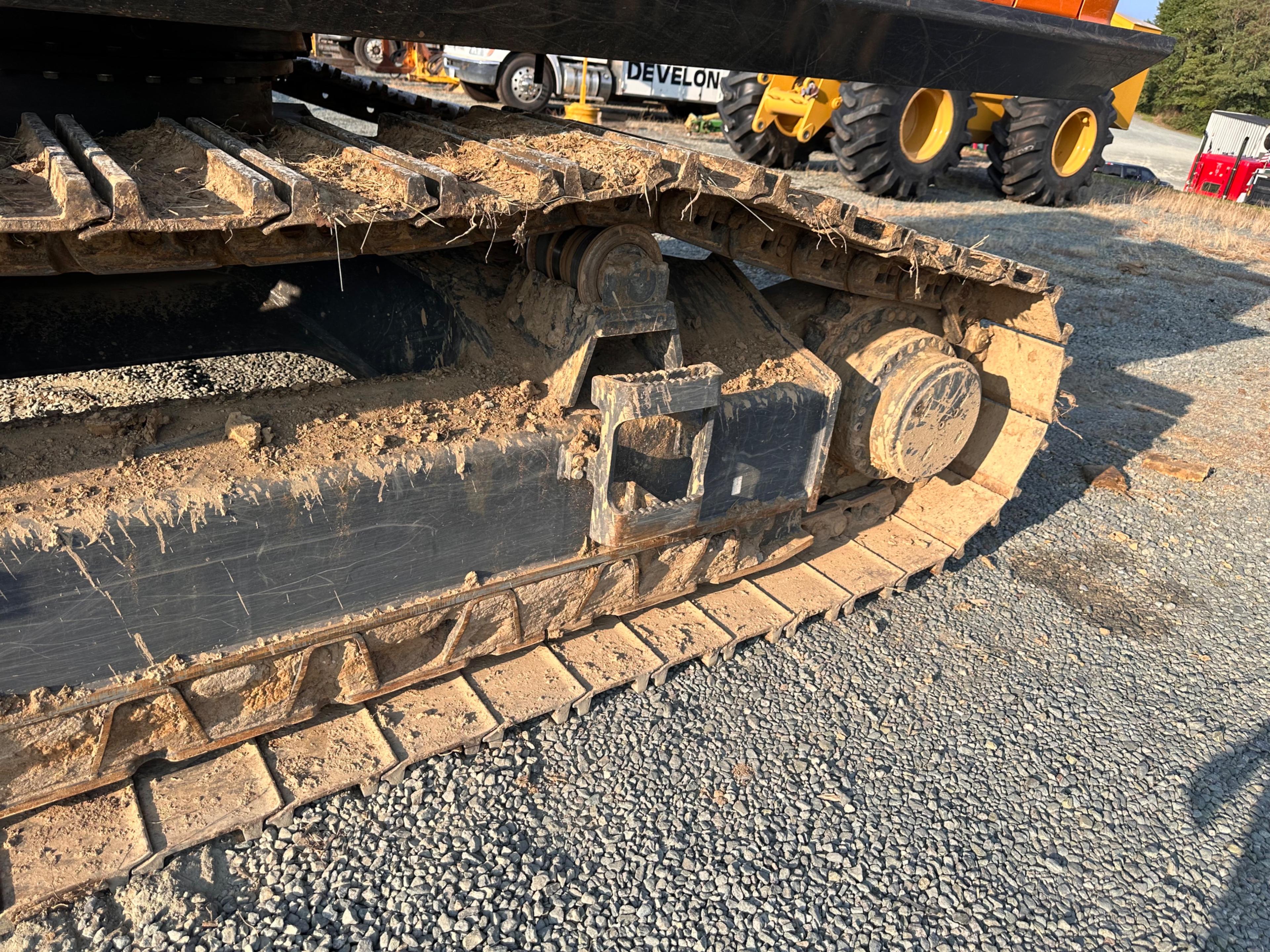 Doosan DX225LL Excavator With Rotodec Grapple Attachment