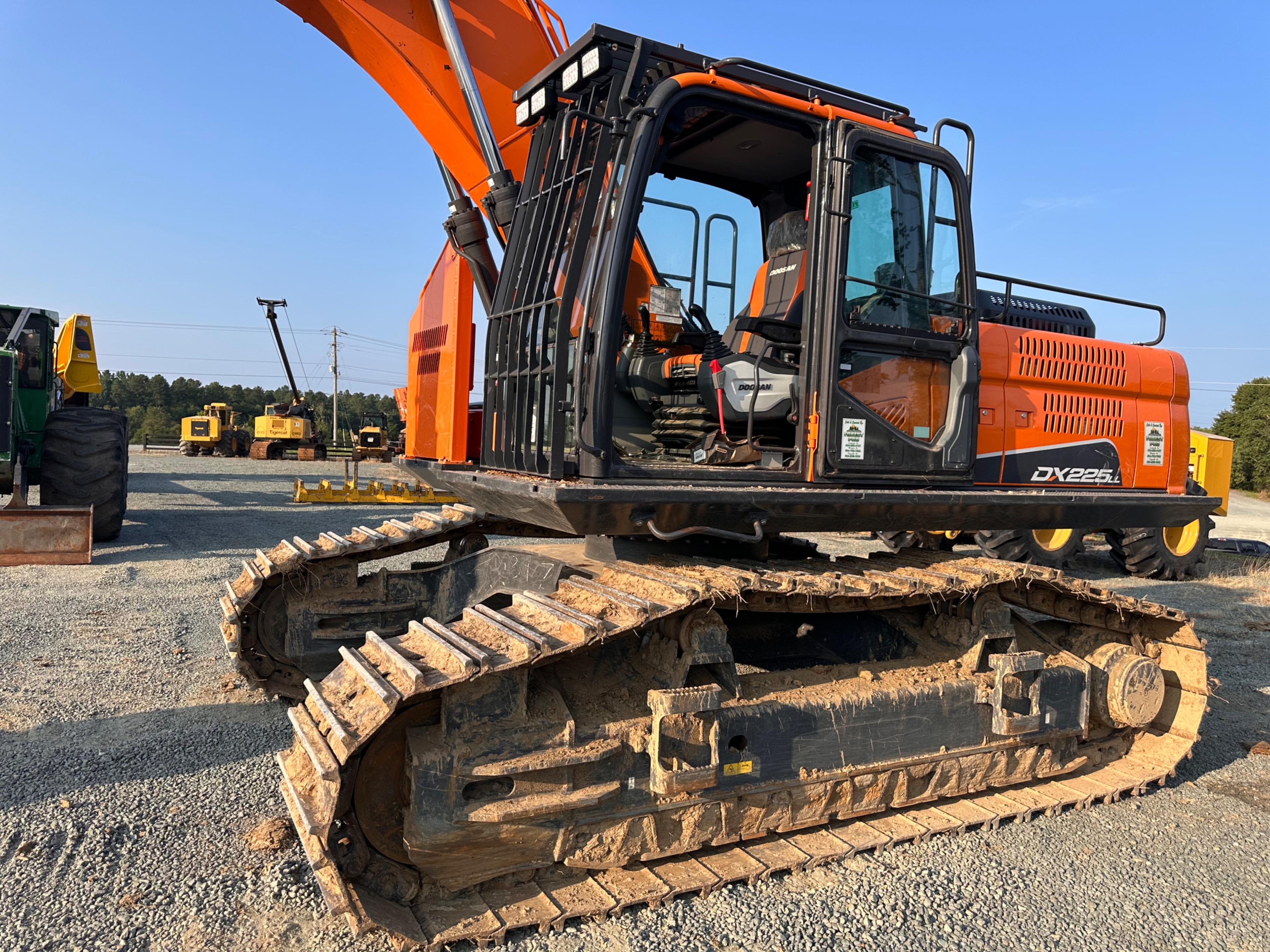 Doosan DX225LL Excavator With Rotodec Grapple Attachment