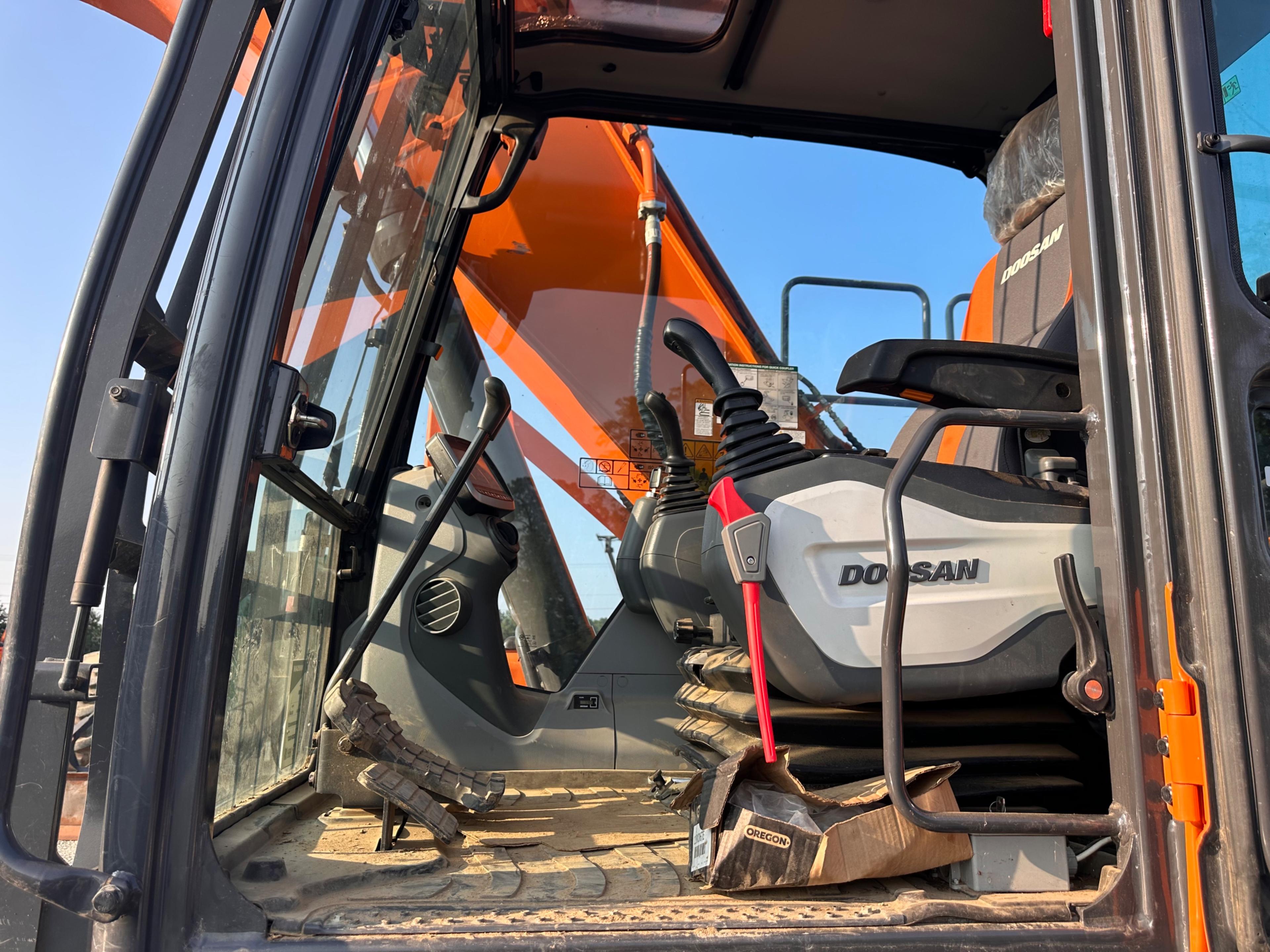 Doosan DX225LL Excavator With Rotodec Grapple Attachment