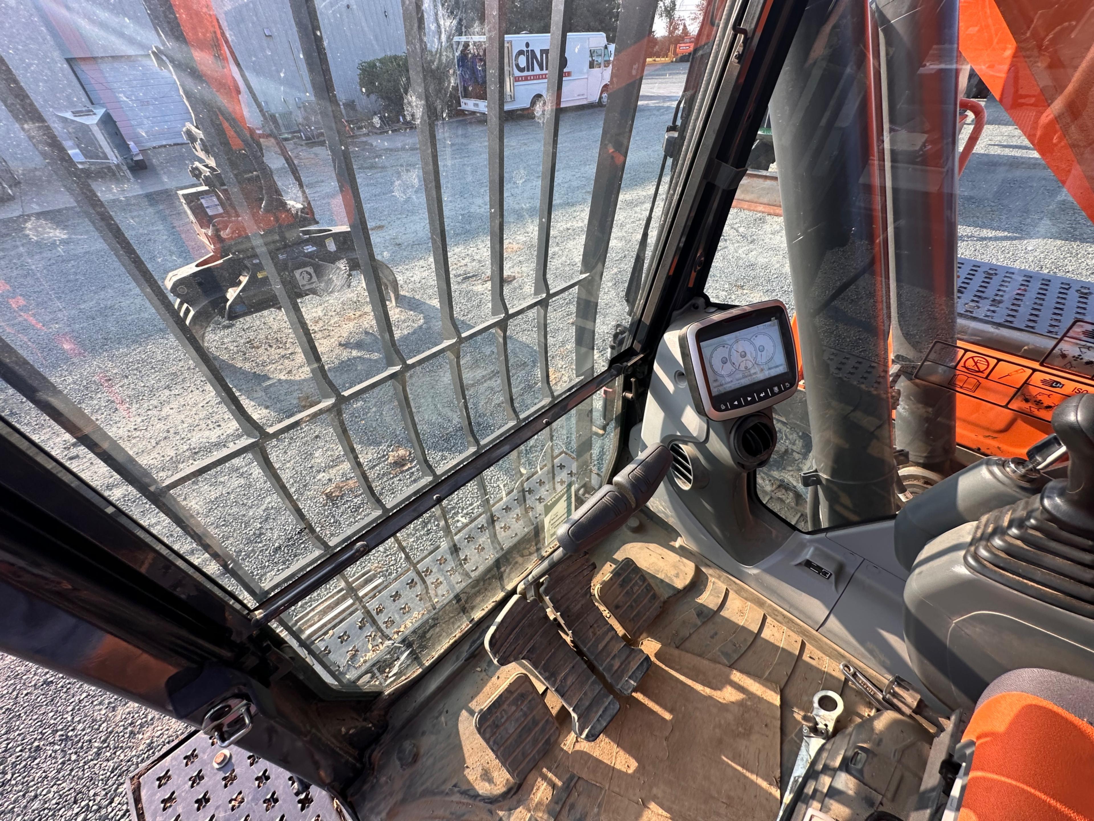 Doosan DX225LL Excavator With Rotodec Grapple Attachment
