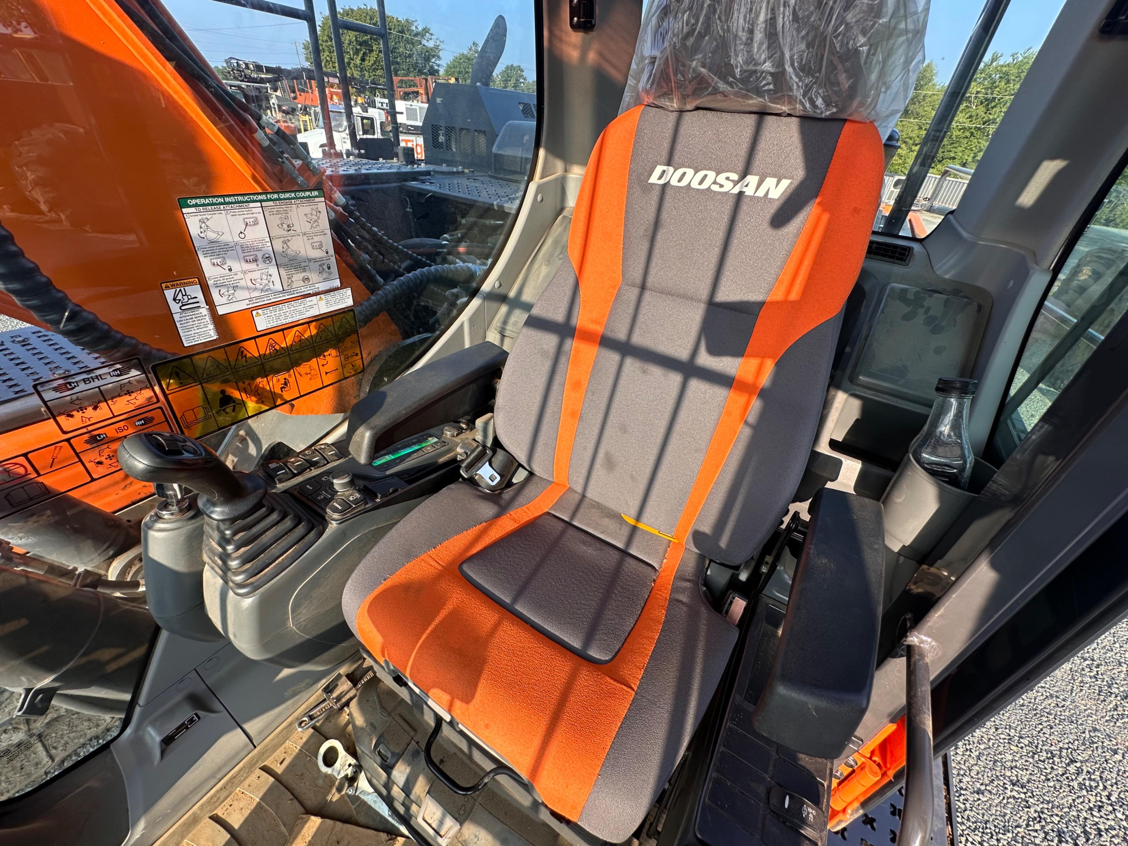Doosan DX225LL Excavator With Rotodec Grapple Attachment