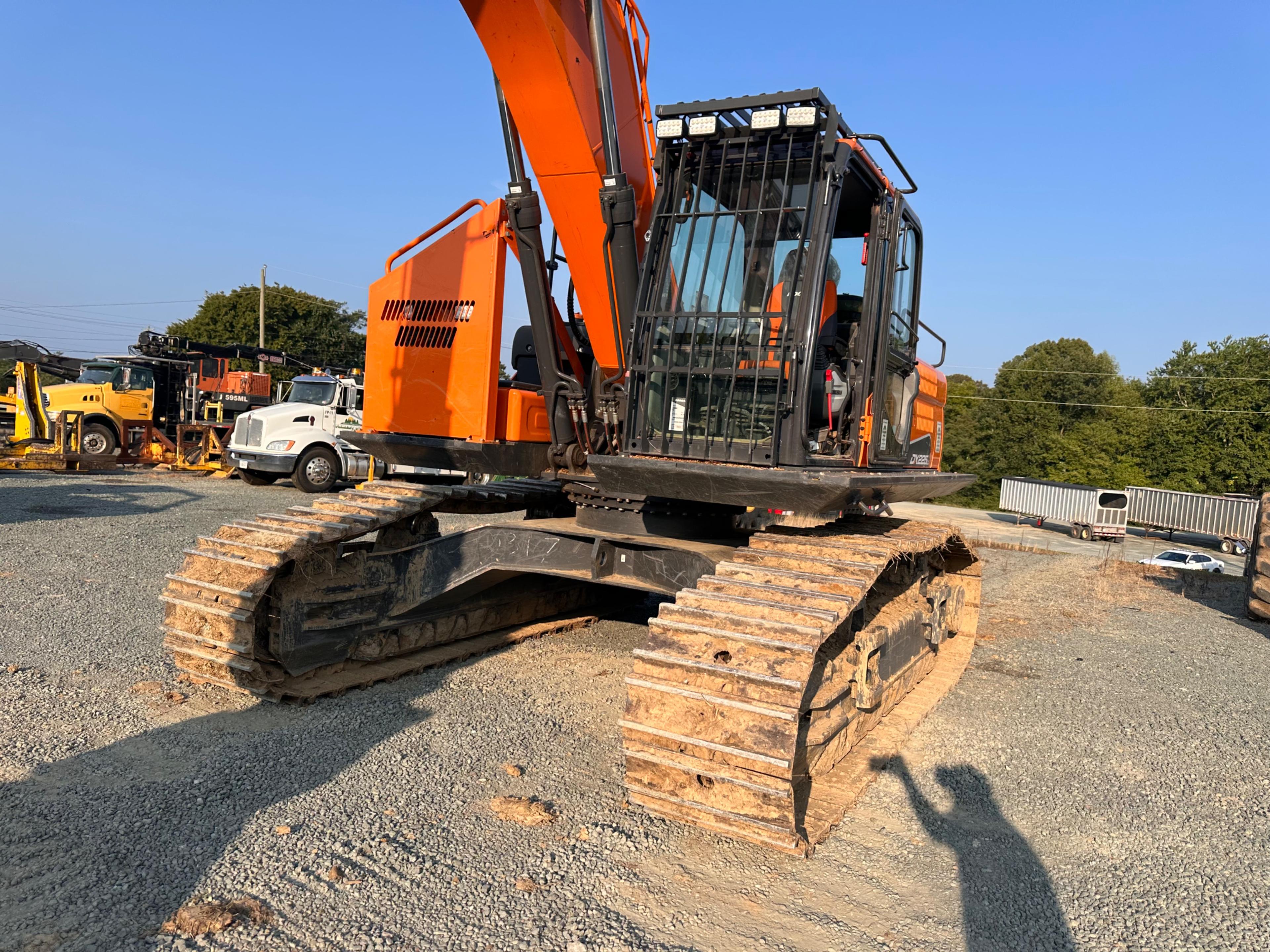 Doosan DX225LL Excavator With Rotodec Grapple Attachment