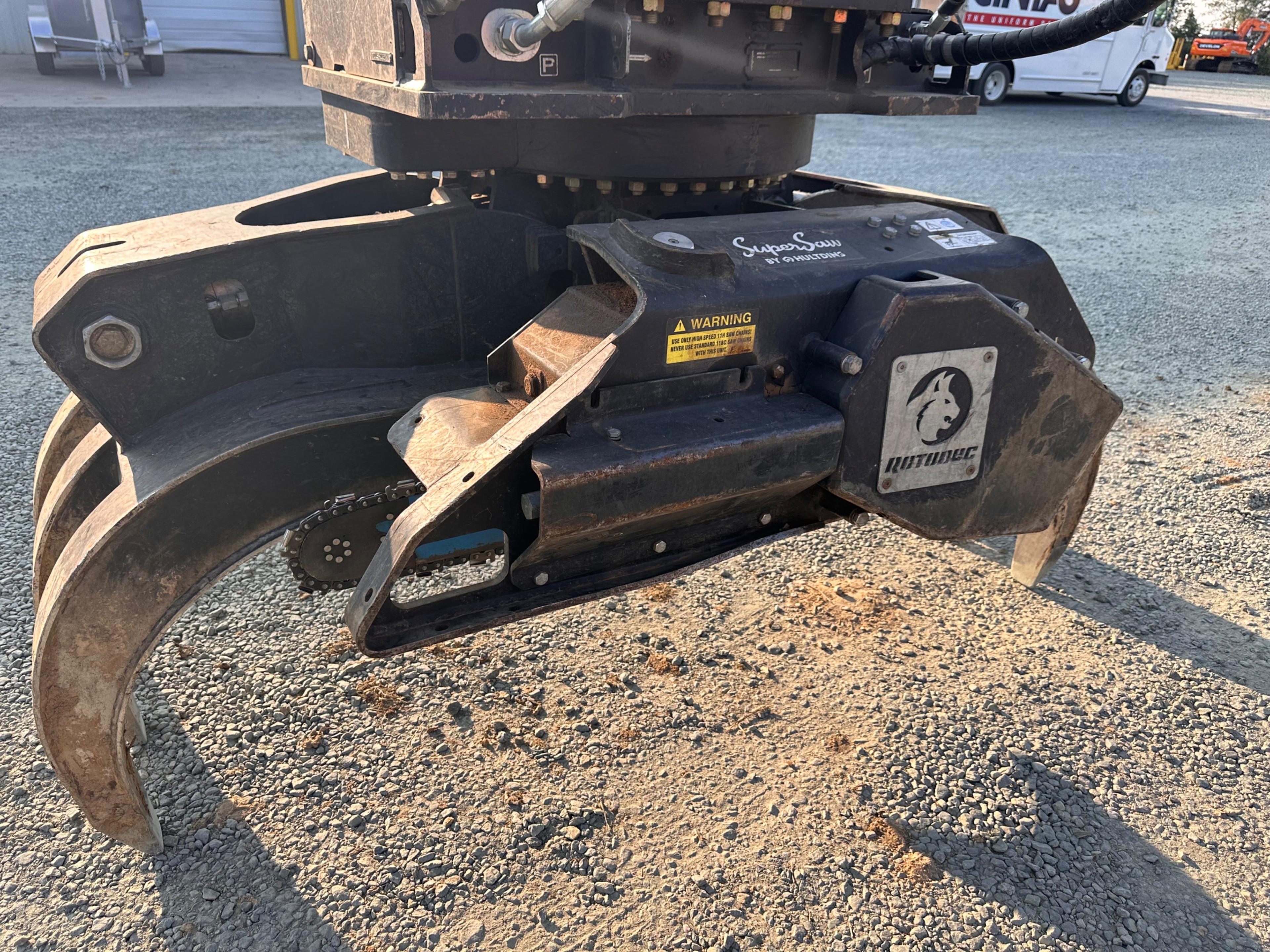 Doosan DX225LL Excavator With Rotodec Grapple Attachment