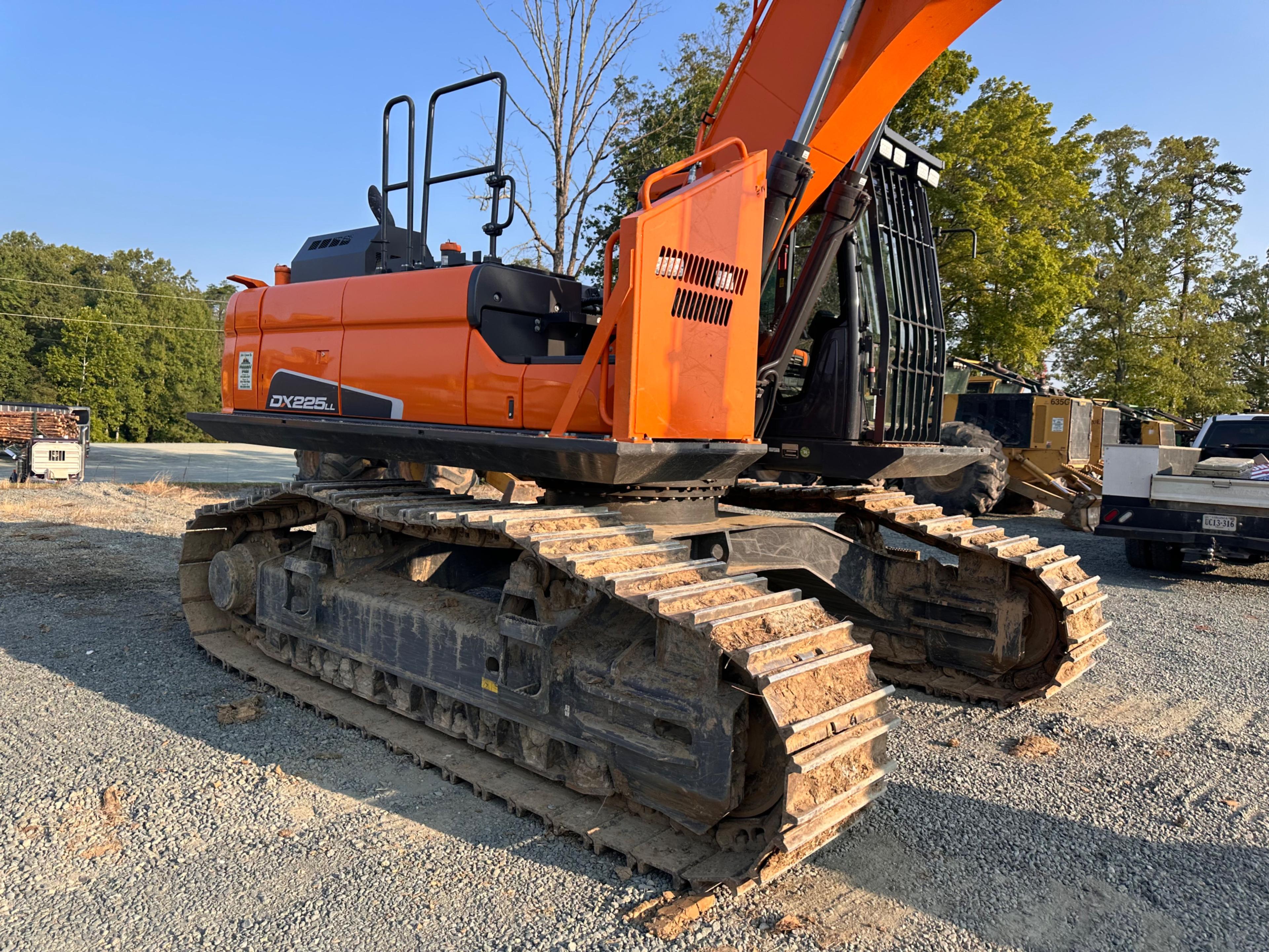 Doosan DX225LL Excavator With Rotodec Grapple Attachment