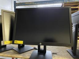 HP 24" MONITORS ON ADJUSTABLE HEIGHT STANDS
