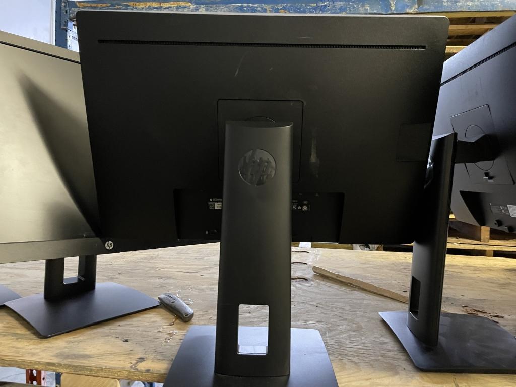 HP 24" MONITORS ON ADJUSTABLE HEIGHT STANDS