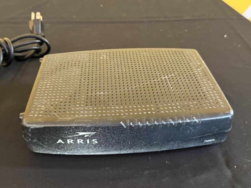 LOT CONSISTING OF (1) ARRIS TM804 MODEM