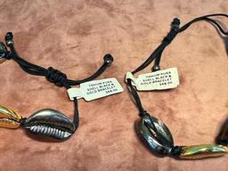 TOHUM PUKA GOLD PLATED AND BLACK SHELL BRACELETS