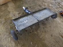 Pull type lawn plugger
