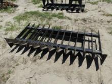 Skid steer root rake
