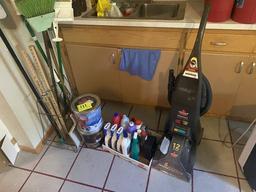 Brooms, cleaning supplies, and vacuum (M