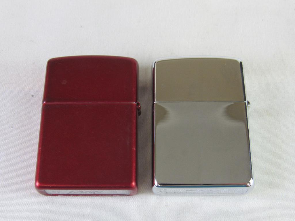 Lot (2) Zippo Lighters. 2006 Chevy Corvette & 1996 Daytona 500