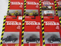 Lot (12) Tonka 1:64 Diecast Trucks MOC