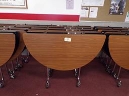 (4) 5ft. round folding cafeteria tables on wheels