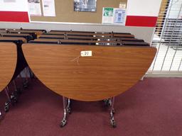 (4) 5ft. round folding cafeteria tables on wheels