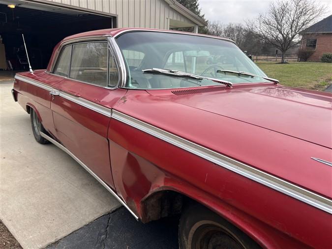 1962 Chevy Impala, 2 door, 283/327 engine, 96,612 miles, comes with original tires & rims