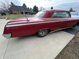 1962 Chevy Impala, 2 door, 283/327 engine, 96,612 miles, comes with original tires & rims