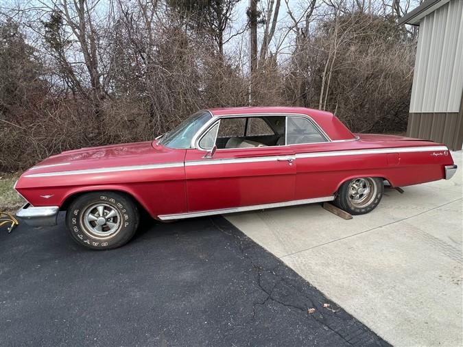 1962 Chevy Impala, 2 door, 283/327 engine, 96,612 miles, comes with original tires & rims