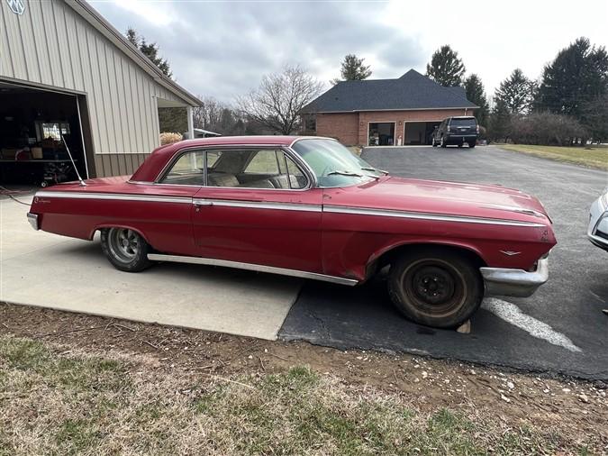 1962 Chevy Impala, 2 door, 283/327 engine, 96,612 miles, comes with original tires & rims