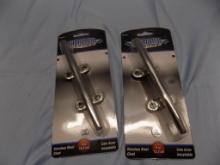 TWO 6IN STAINLESS STEEL CLEATS