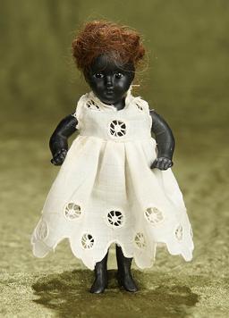 5" German black-complexioned all-bisque doll. $300/400