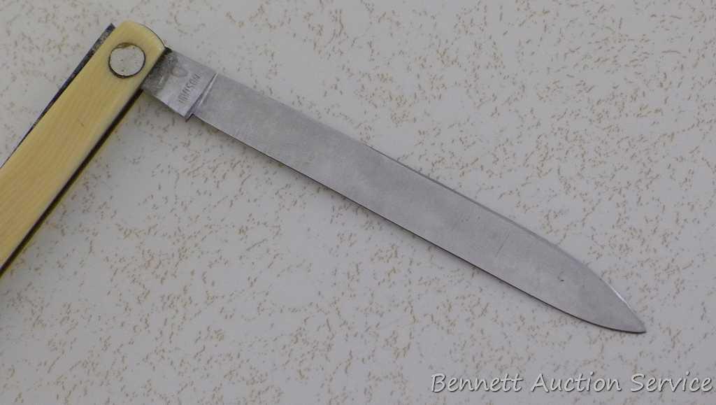 Unsharpened and unused promotional melon knife made in Germany by Murcott. 8-1/2" open. Advertises