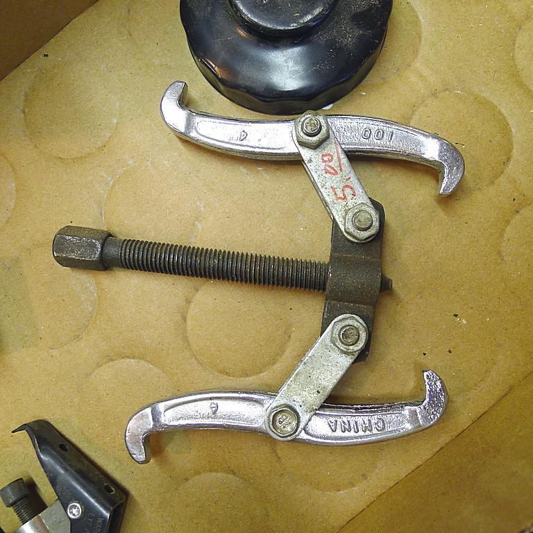4" two jaw puller; three oil filter wrenches; smaller adjustable puller.