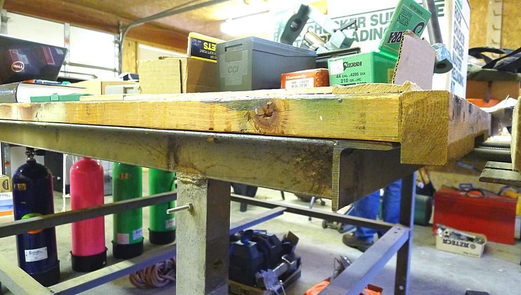 Great sturdy steel framed work bench measures 82" x 56" x 37" high. Each end has a vise mounted as