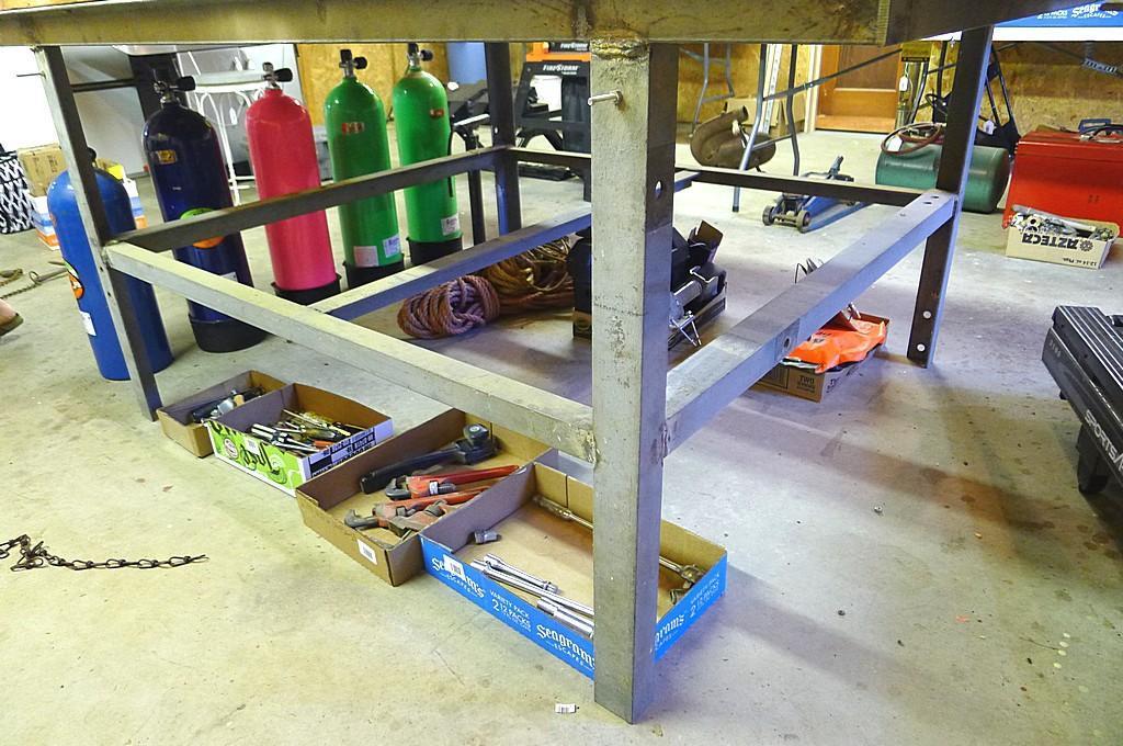 Great sturdy steel framed work bench measures 82" x 56" x 37" high. Each end has a vise mounted as