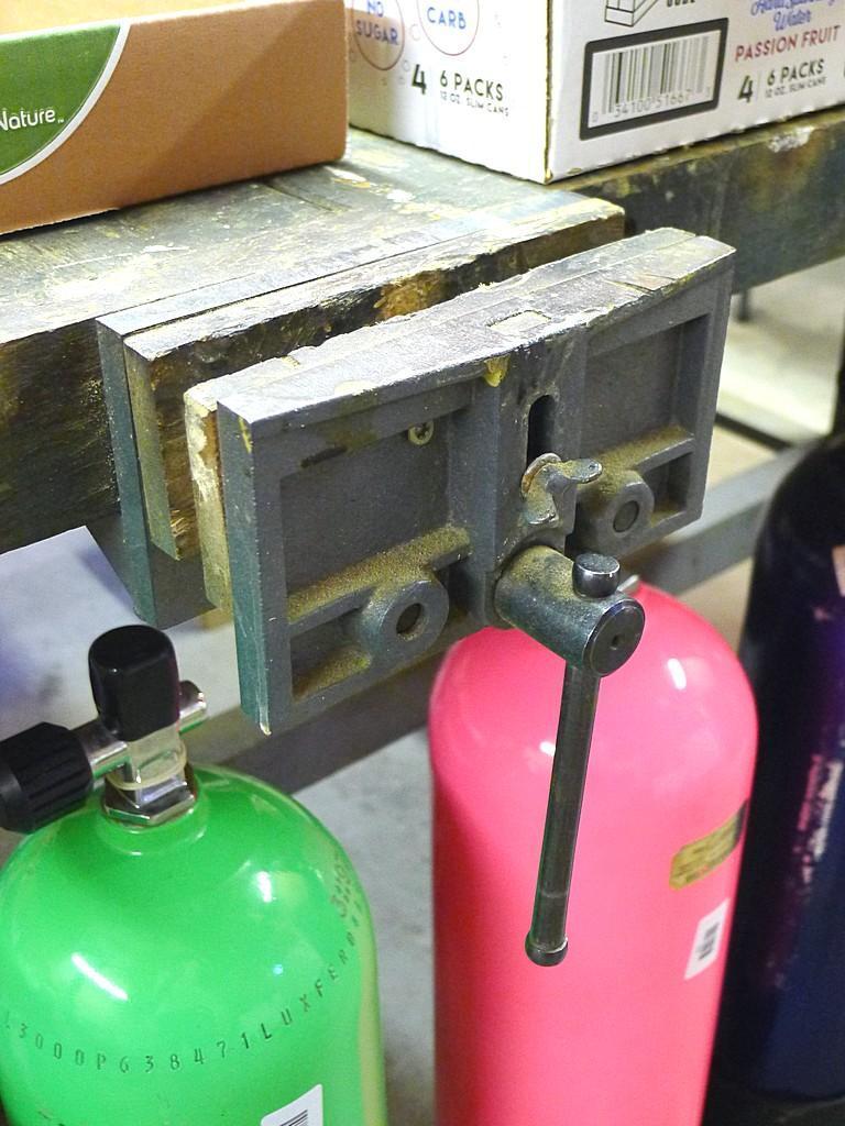 Great sturdy steel framed work bench measures 82" x 56" x 37" high. Each end has a vise mounted as