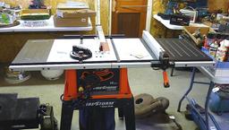 Black and Decker FireStorm 10" table saw with steel floor stand and dust collection bag. Table with