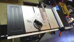 Black and Decker FireStorm 10" table saw with steel floor stand and dust collection bag. Table with