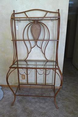 Metal framed wine rack with two glass shelves and a bottom wire shelf. Approx. 6' tall x 3' wide x