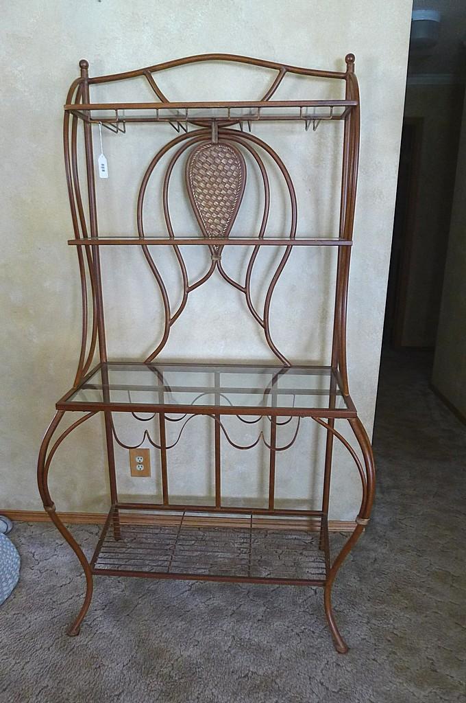 Metal framed wine rack with two glass shelves and a bottom wire shelf. Approx. 6' tall x 3' wide x