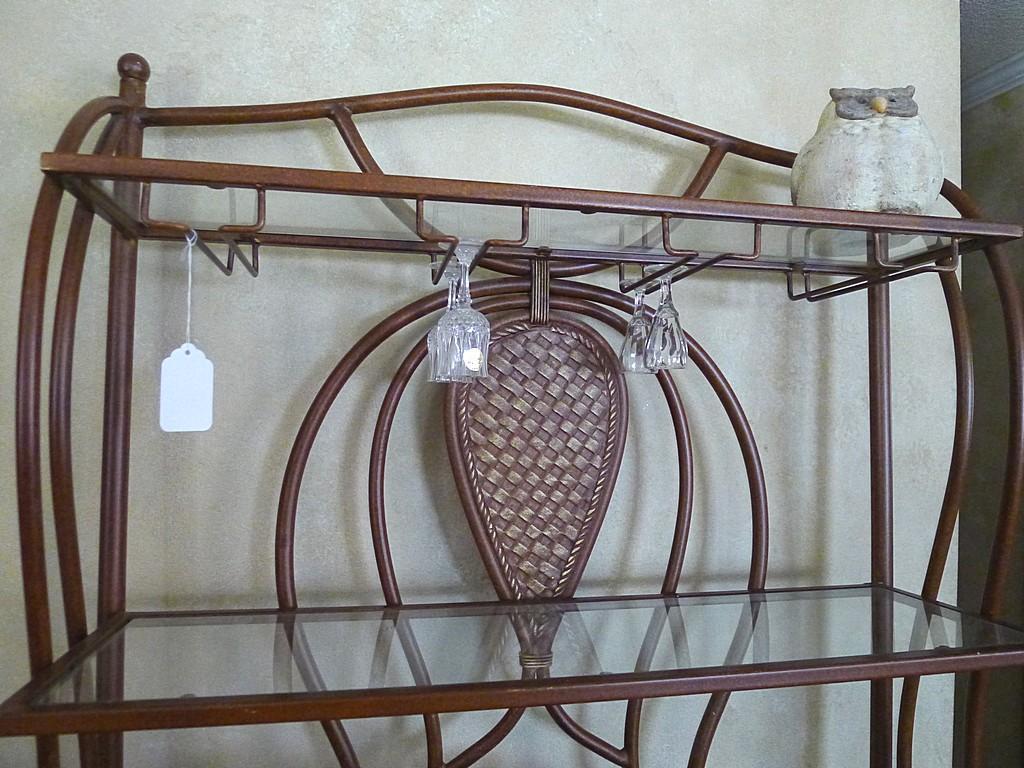 Metal framed wine rack with two glass shelves and a bottom wire shelf. Approx. 6' tall x 3' wide x