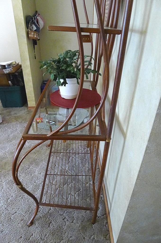 Metal framed wine rack with two glass shelves and a bottom wire shelf. Approx. 6' tall x 3' wide x
