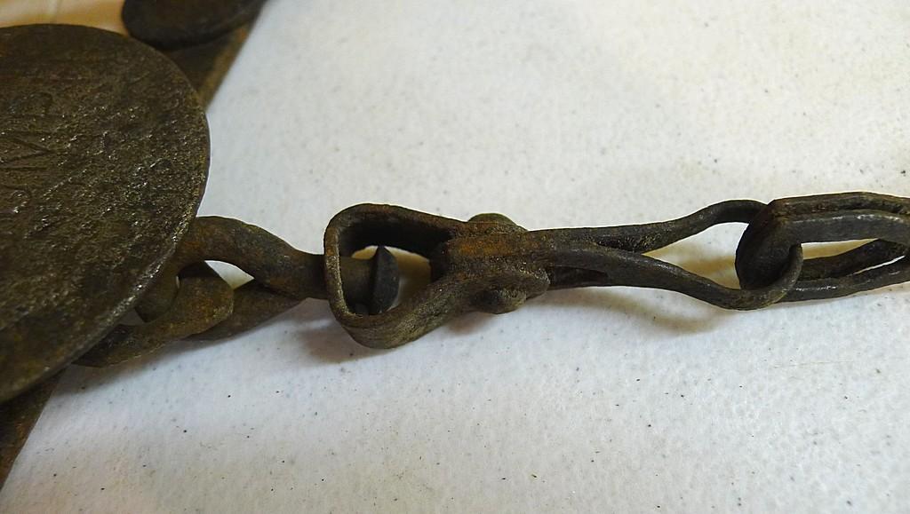 Triumph No. 3 double long spring trap is 17" and appears original and complete. Triumph No. 1-1/2