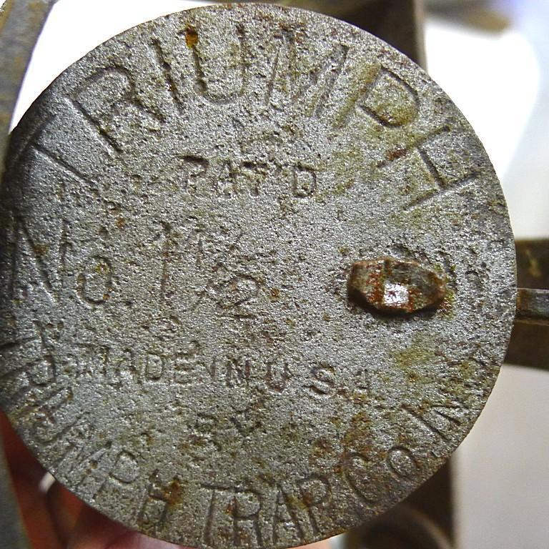 Triumph No. 3 double long spring trap is 17" and appears original and complete. Triumph No. 1-1/2