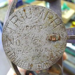 Triumph No. 3 double long spring trap is 17" and appears original and complete. Triumph No. 1-1/2