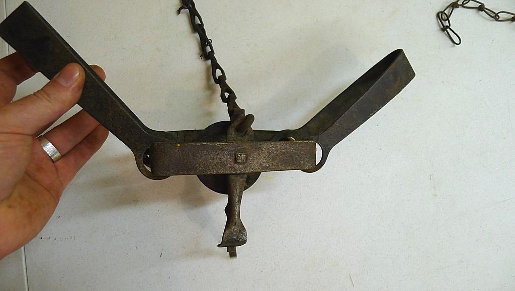 Triumph No. 3 double long spring trap is 17" and appears original and complete. Triumph No. 1-1/2