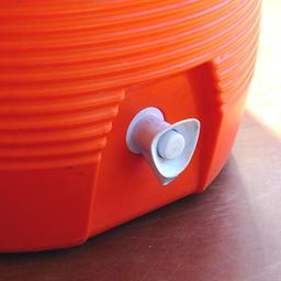 Rubbermaid 5 gallon water cooler, assorted vinyl tablecloths and one more. Some tablecloths have