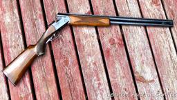 12 gauge over/under shotgun with double triggers and 28" barrels, manufactured by Boito for KMart