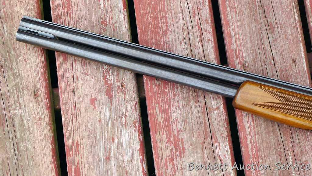 12 gauge over/under shotgun with double triggers and 28" barrels, manufactured by Boito for KMart