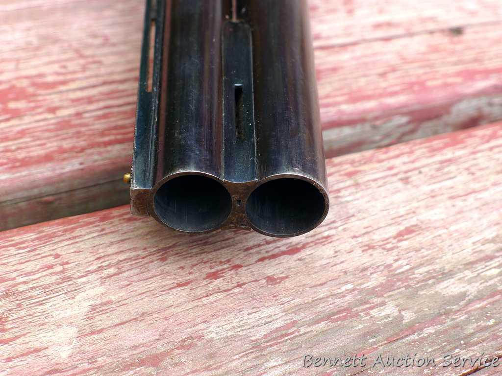 12 gauge over/under shotgun with double triggers and 28" barrels, manufactured by Boito for KMart